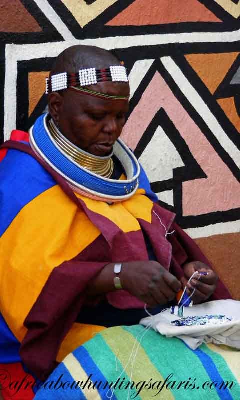 Ndebele lady doing bead work